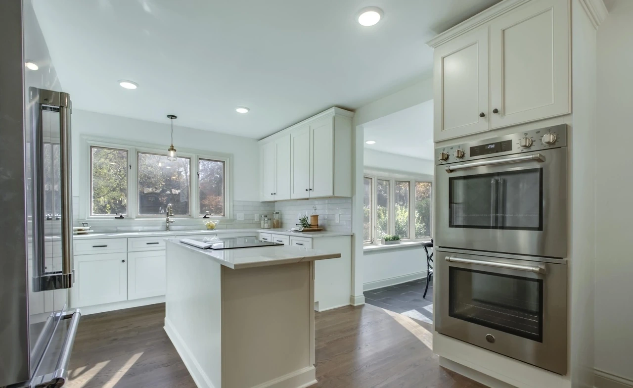 White Kitchen Remodel by Scruffy City Construction Inc. project photo 3