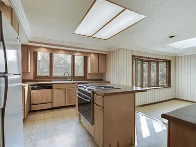White Kitchen Remodel by Scruffy City Construction Inc. project photo 2