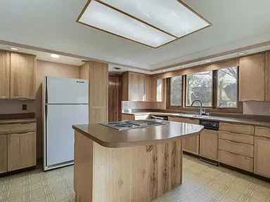 White Kitchen Remodel by Scruffy City Construction Inc. project photo 4
