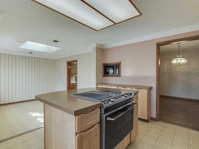 White Kitchen Remodel by Scruffy City Construction Inc. project photo 5